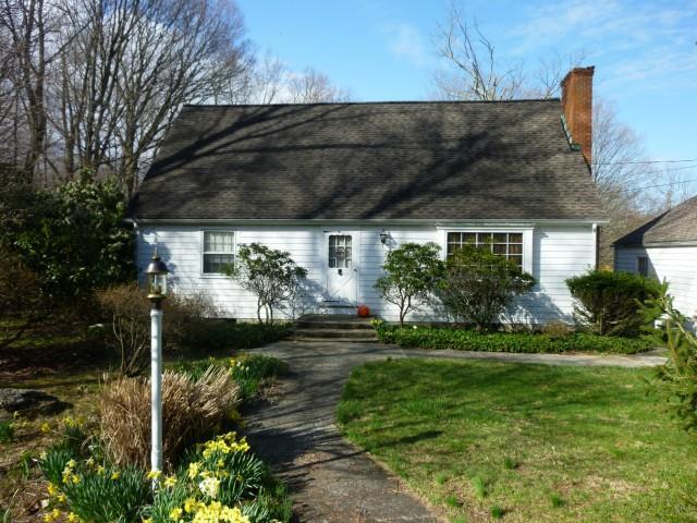 2305 Hillside Road Fairfield, CT 06824 - Photo 1 of 1 a patio with table and chairs and potted plants