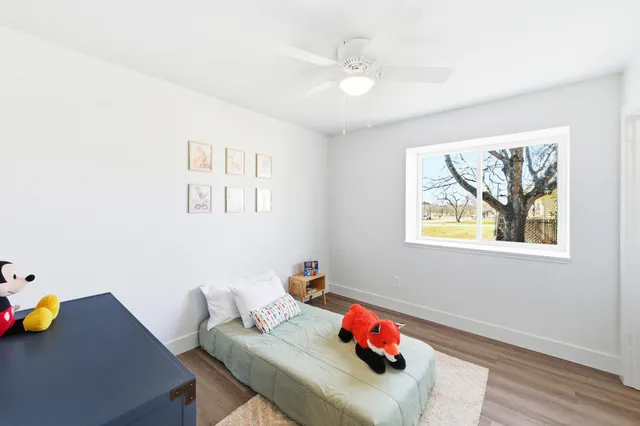 a workspace with furniture and window