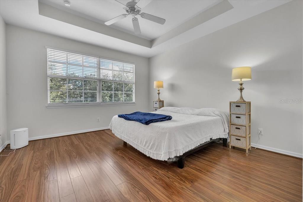 3954 Cherrybrook Loop Fort Myers, FL 33966 - Photo 23 of 47 a bedroom with a bed and a dresser