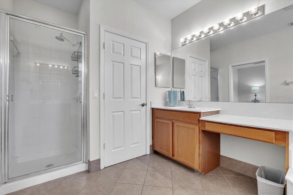 3954 Cherrybrook Loop Fort Myers, FL 33966 - Photo 27 of 47 a bathroom with a granite countertop sink mirror and double