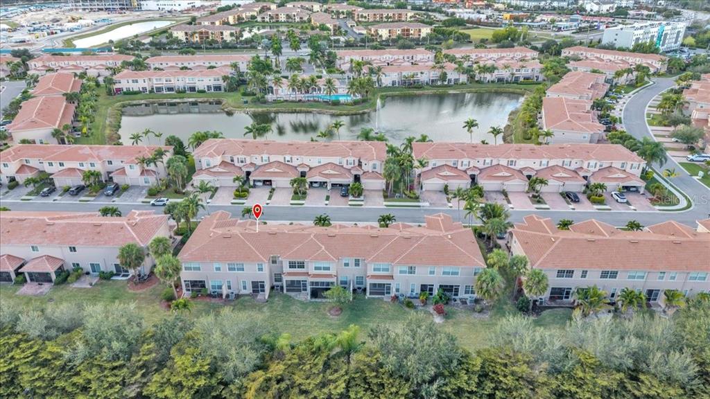 3954 Cherrybrook Loop Fort Myers, FL 33966 - Photo 40 of 47 an aerial view of house with yard and lake view