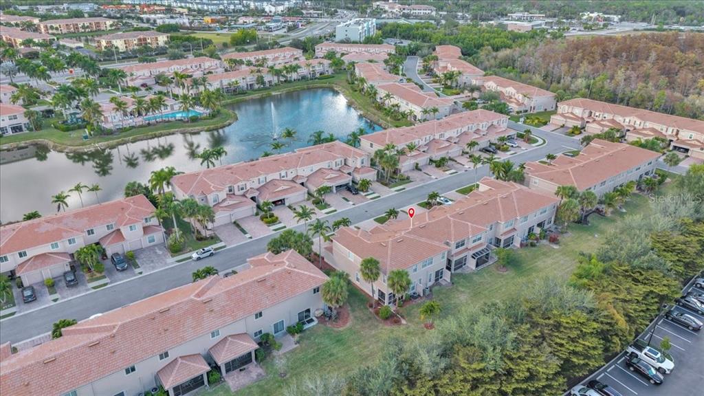 3954 Cherrybrook Loop Fort Myers, FL 33966 - Photo 41 of 47 an aerial view of a city with lake view