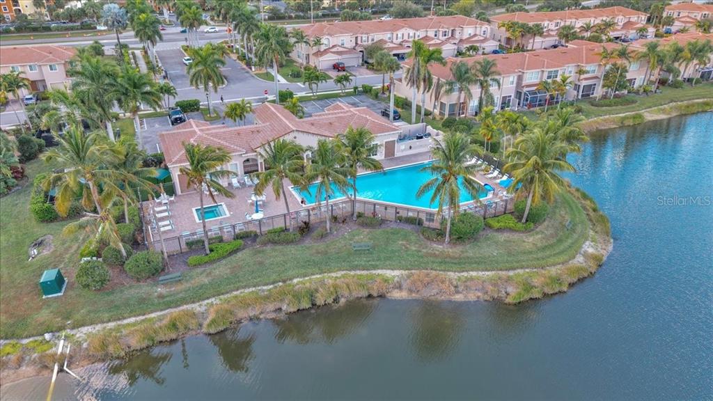 3954 Cherrybrook Loop Fort Myers, FL 33966 - Photo 44 of 47 an aerial view of residential houses with outdoor space and lake view