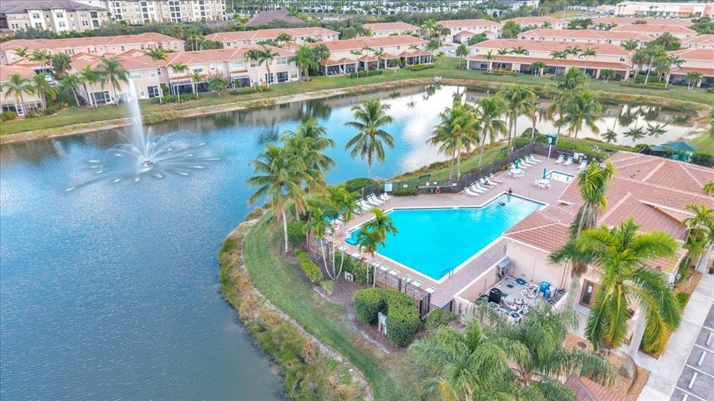 3954 Cherrybrook Loop Fort Myers, FL 33966 - Photo 46 of 47 an aerial view of residential houses with outdoor space and lake view
