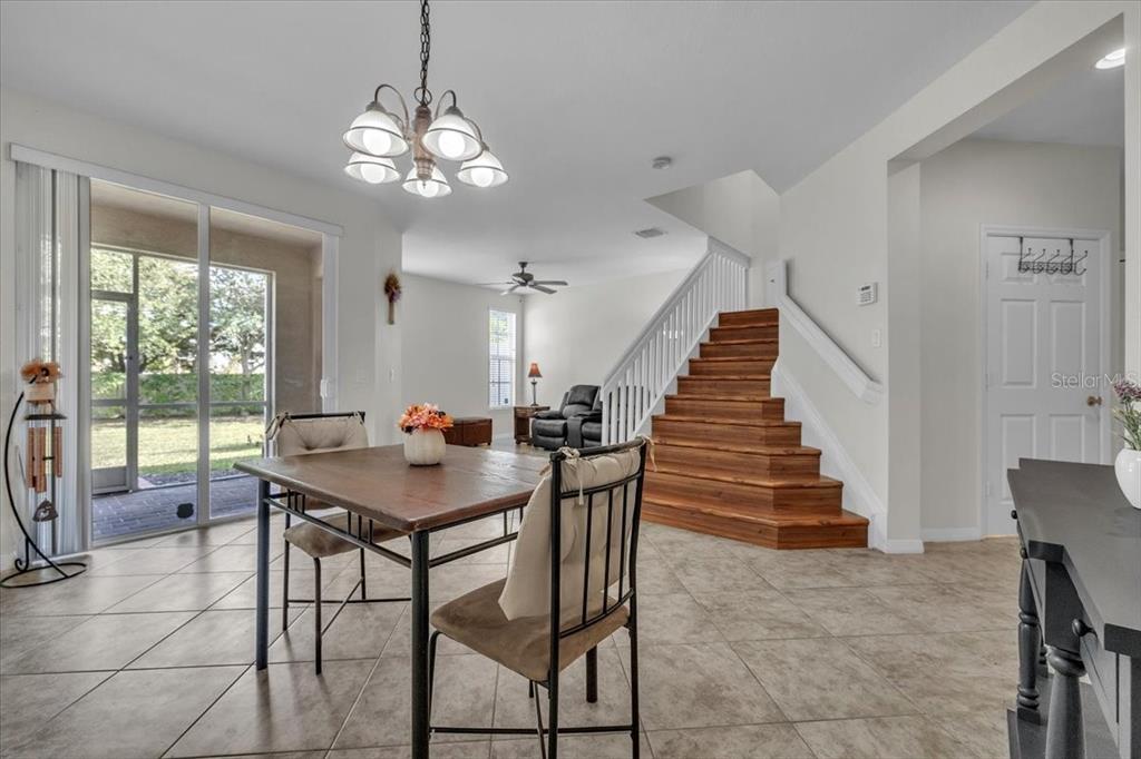 3954 Cherrybrook Loop Fort Myers, FL 33966 - Photo 7 of 47 a view of a dining room with furniture window and wooden floor
