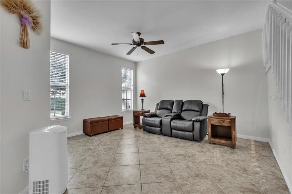 3954 Cherrybrook Loop Fort Myers, FL 33966 - Photo 8 of 47 a living room with furniture and a window