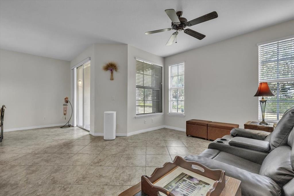 3954 Cherrybrook Loop Fort Myers, FL 33966 - Photo 9 of 47 a living room with furniture and a window