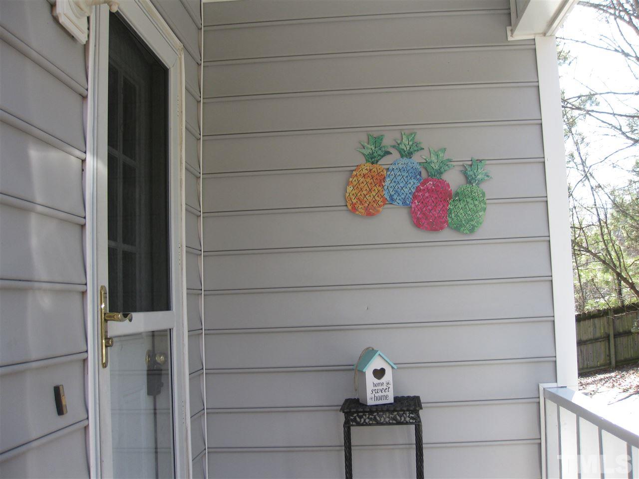 6912 Three Bridges Circle Raleigh, NC 27613 - Photo 3 of 12 covered side entry
