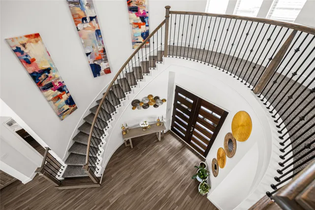 a view of entryway with wooden floor