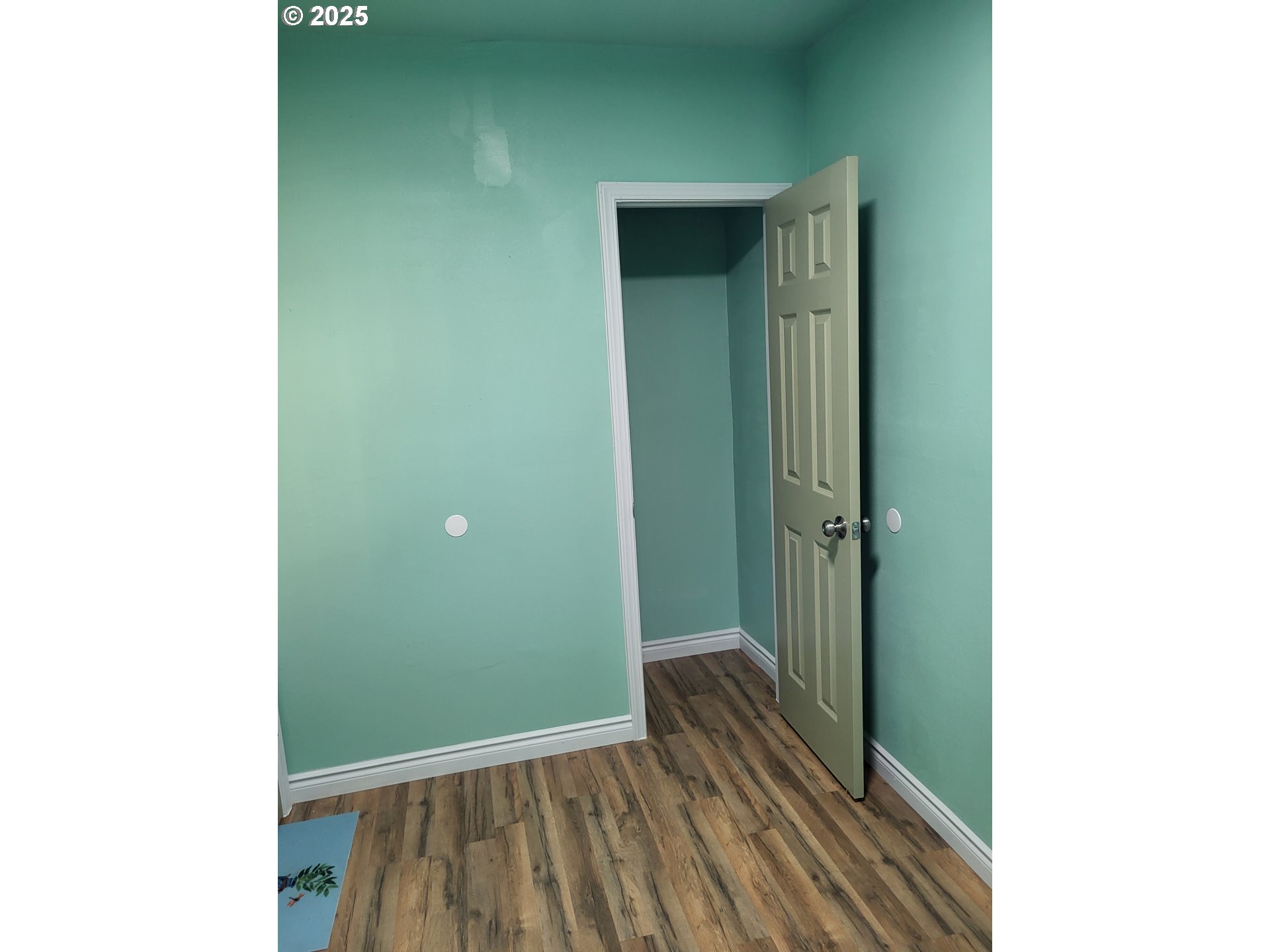 811 Laurel Avenue Reedsport, OR 97467 - Photo 14 of 34 a view of a room with wooden floor