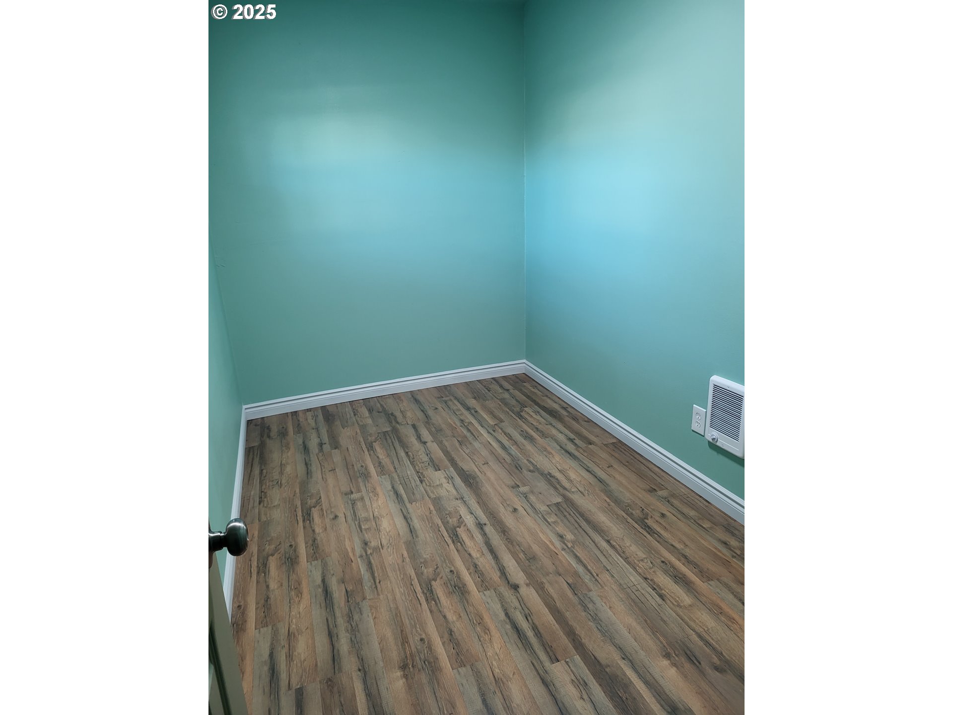 811 Laurel Avenue Reedsport, OR 97467 - Photo 15 of 34 a view of a small space with wooden floor