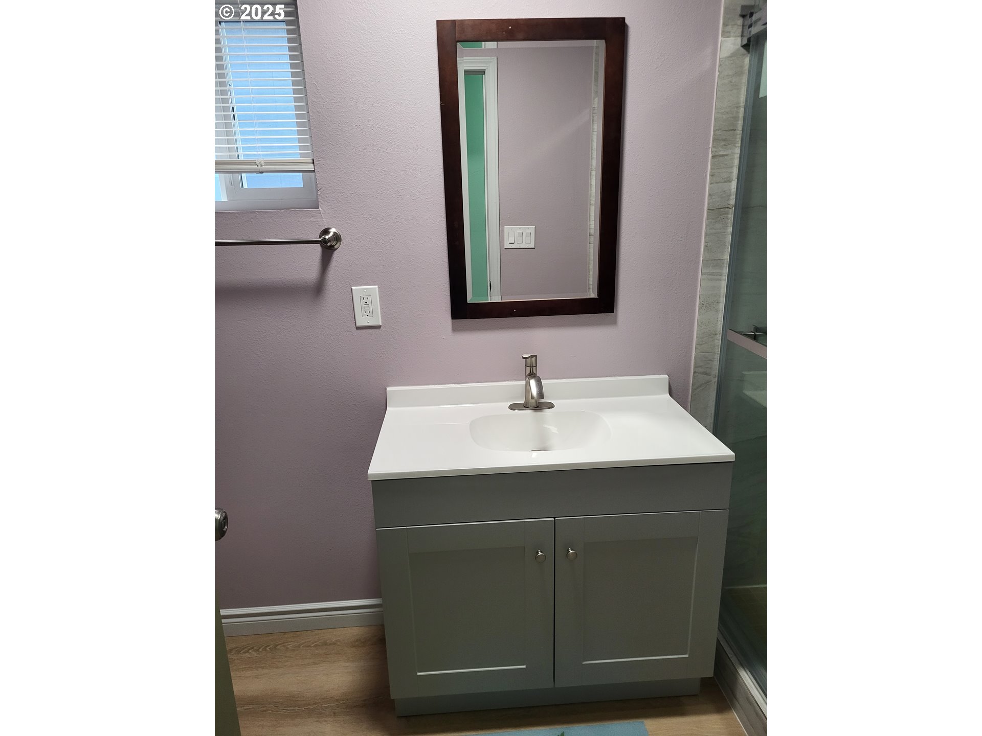 811 Laurel Avenue Reedsport, OR 97467 - Photo 17 of 34 a bathroom with a sink and a mirror