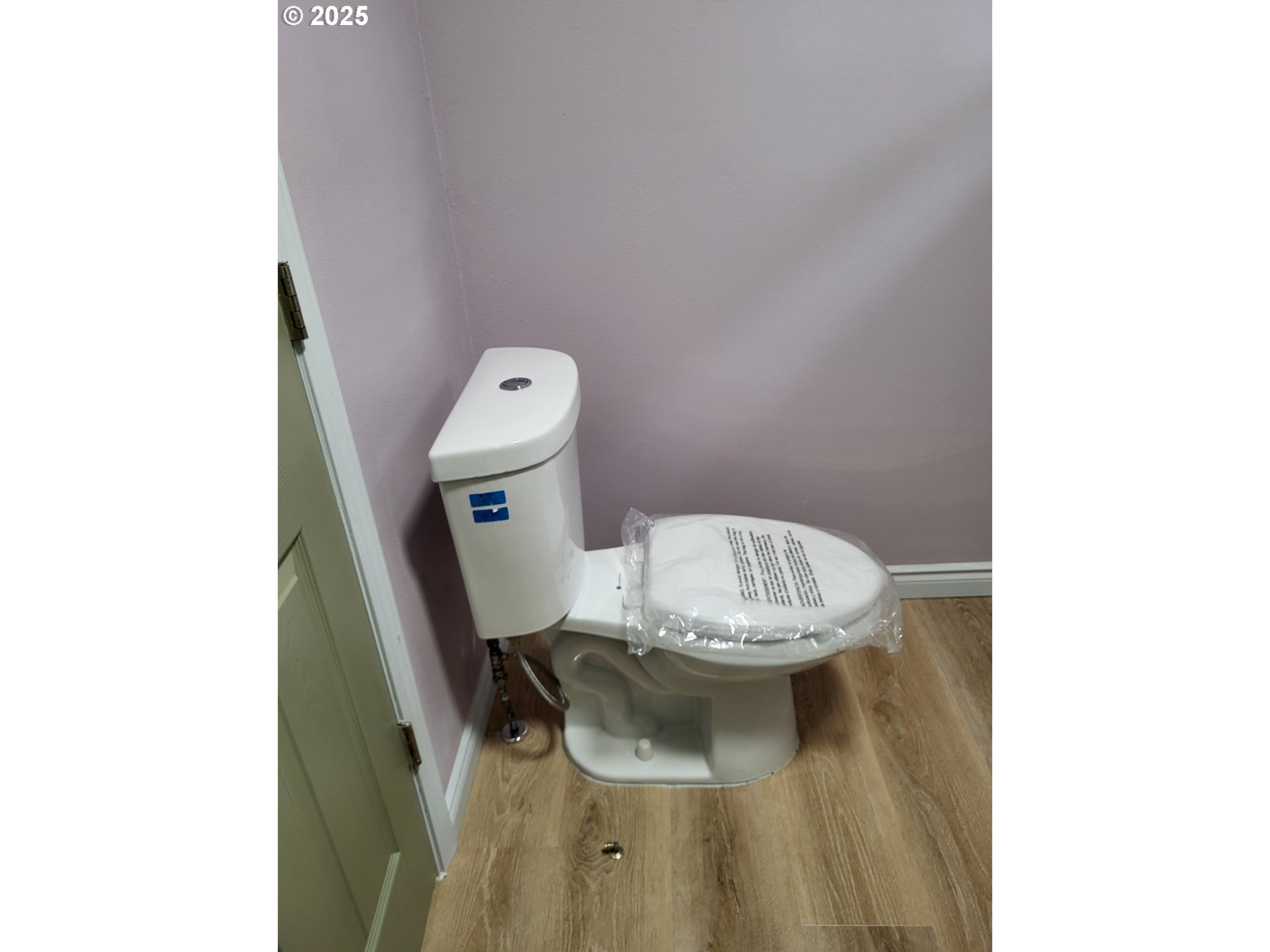 811 Laurel Avenue Reedsport, OR 97467 - Photo 18 of 34 a bathroom with a toilet and a sink