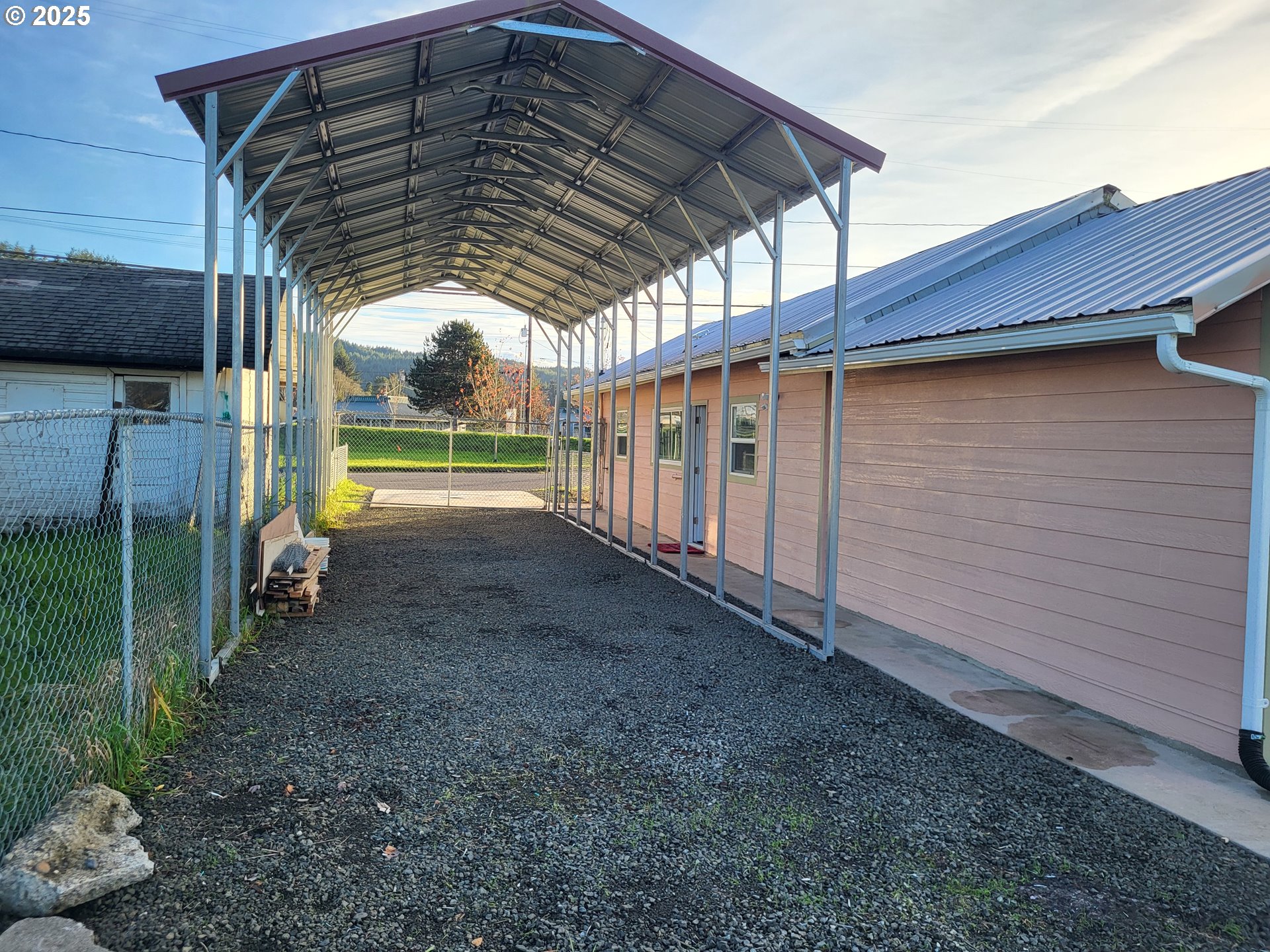 811 Laurel Avenue Reedsport, OR 97467 - Photo 28 of 34 a backyard of a house with lots of green space