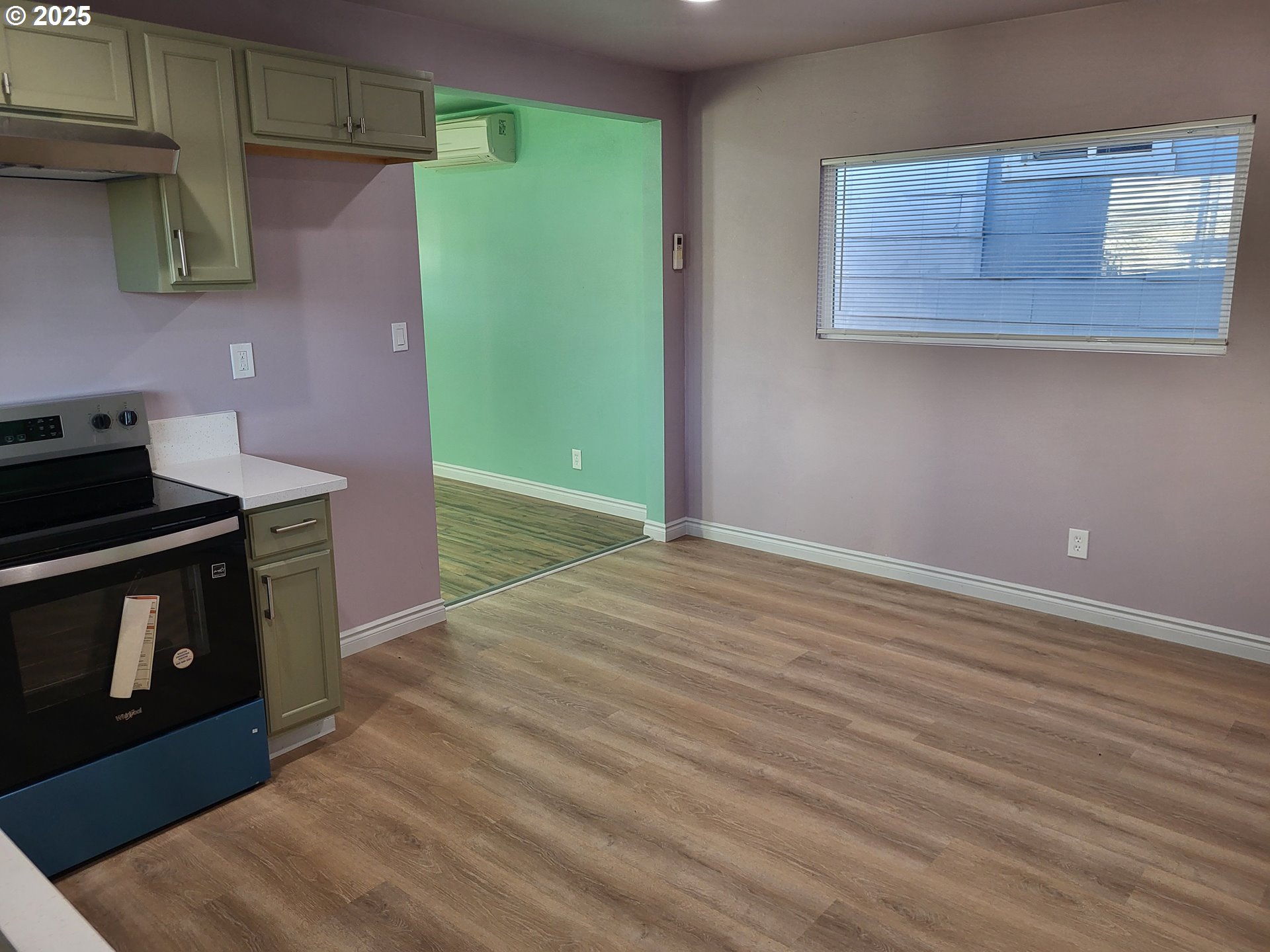 811 Laurel Avenue Reedsport, OR 97467 - Photo 7 of 34 a kitchen with stainless steel appliances wooden cabinets and a stove top oven