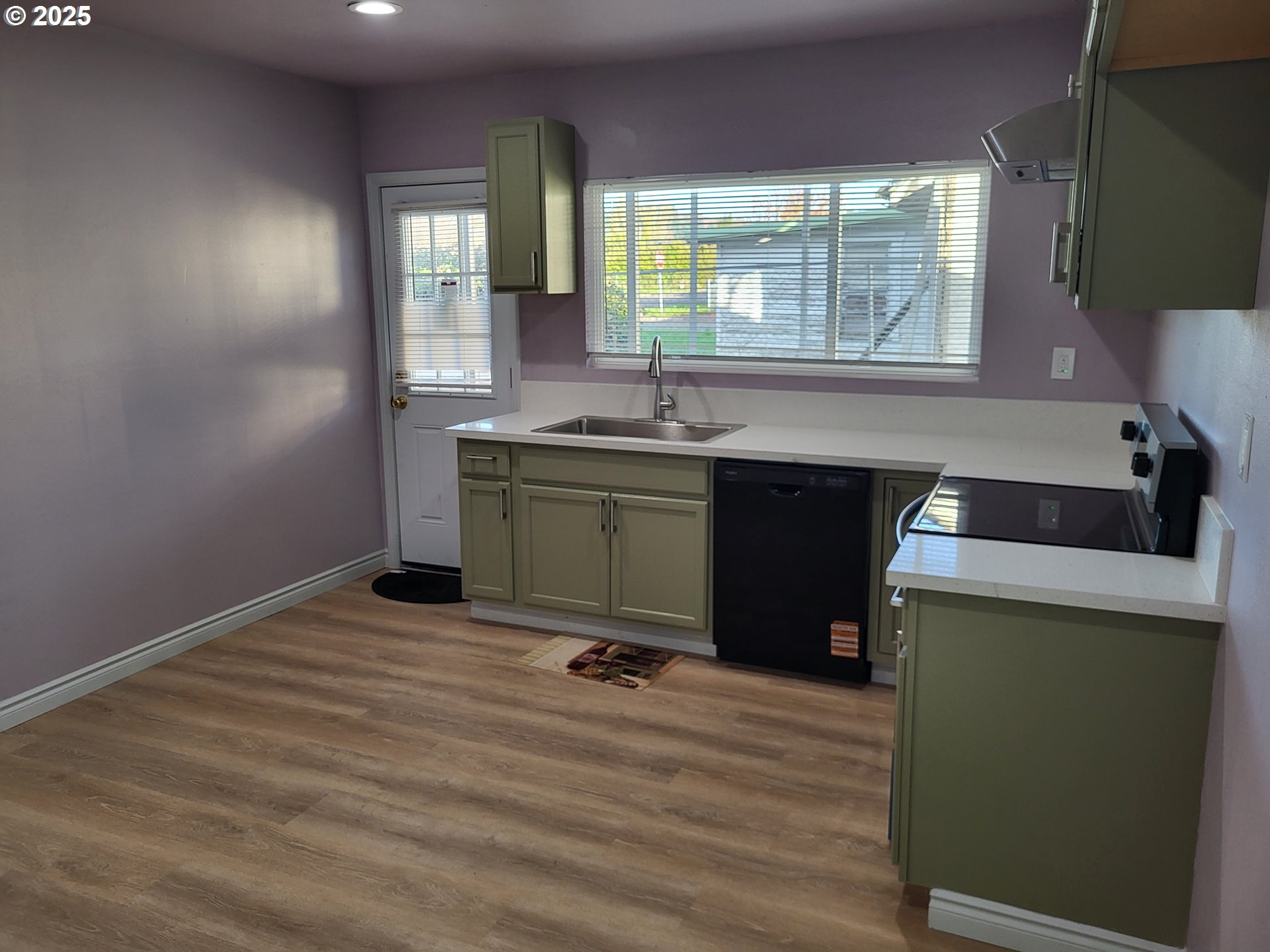 811 Laurel Avenue Reedsport, OR 97467 - Photo 9 of 34 a room with a window and a wooden floor