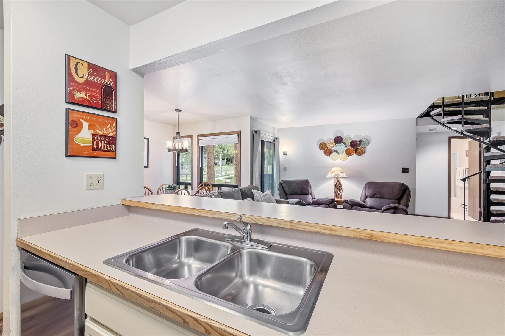 100 Wild Irishman Road, Unit 1103 Keystone, CO 80435 - Photo 11 of 33 Kitchen featuring hanging light fixtures, sink, an inviting chandelier, and stainless steel dishwasher