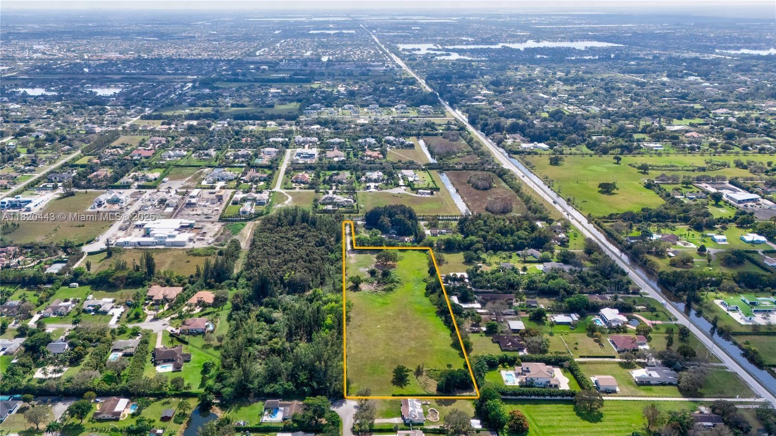 17100 Southwest 54th Street Southwest Ranches, FL 33331 - Photo 5 of 5 an aerial view of residential houses with outdoor space and swimming pool