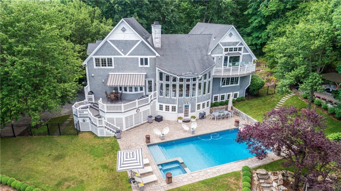 1 1/2 Acres of landscaped garden with brand new heated pool and spa.