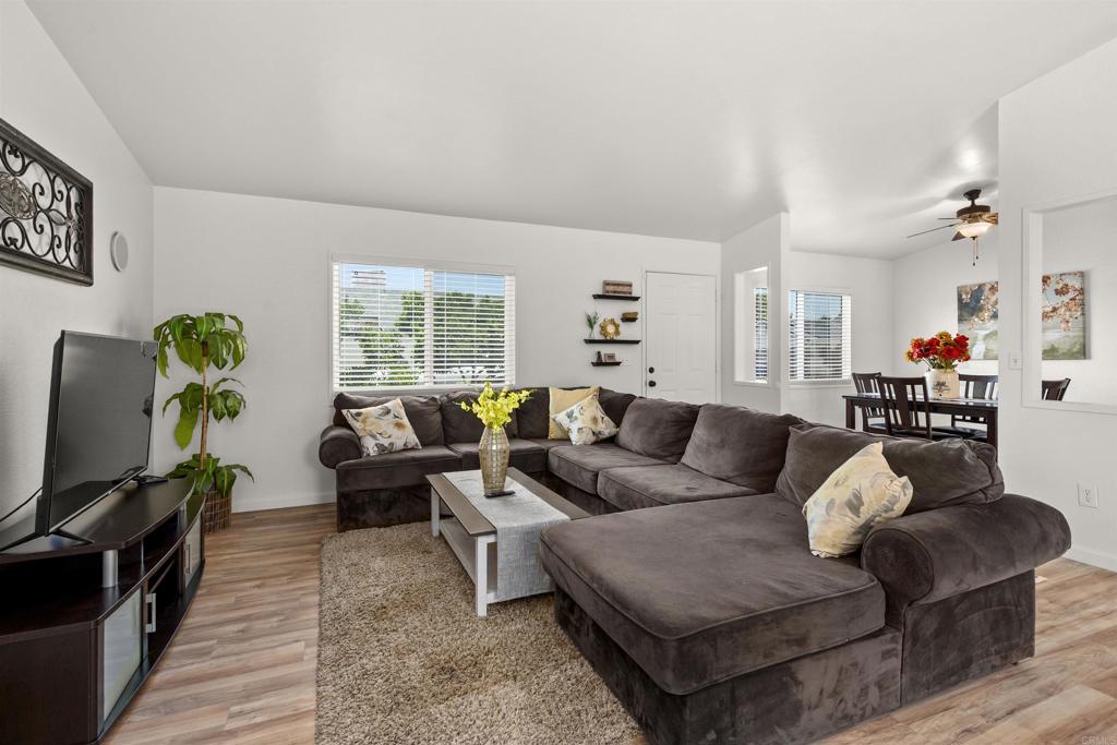 8620 Atlas View Drive Santee, CA 92071 - Photo 11 of 58 a living room with furniture and a flat screen tv