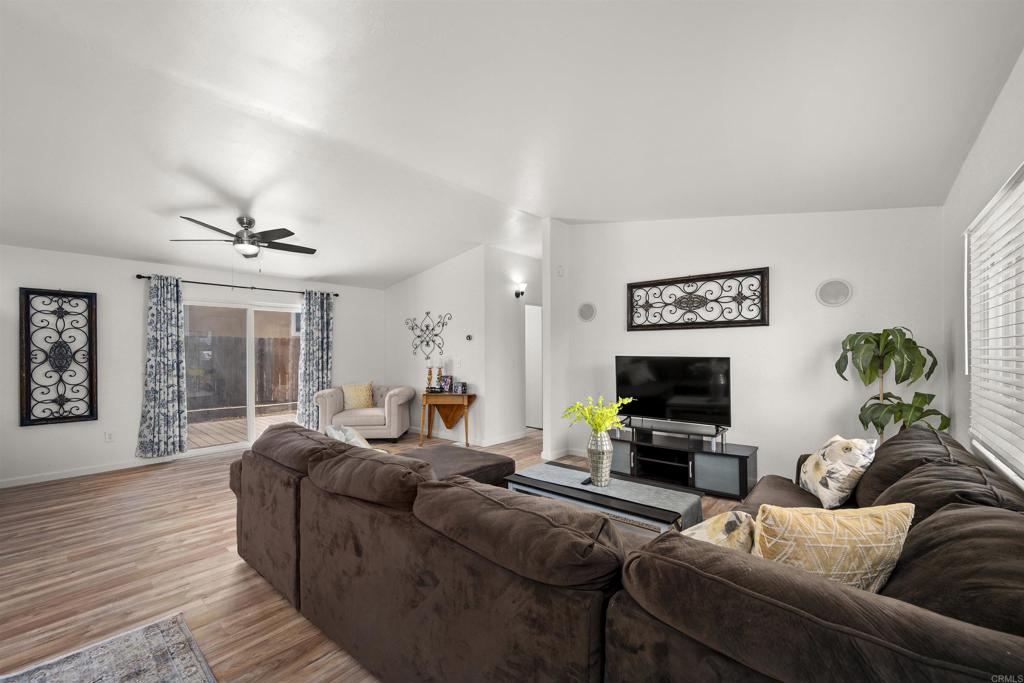 8620 Atlas View Drive Santee, CA 92071 - Photo 13 of 58 a living room with furniture and a flat screen tv
