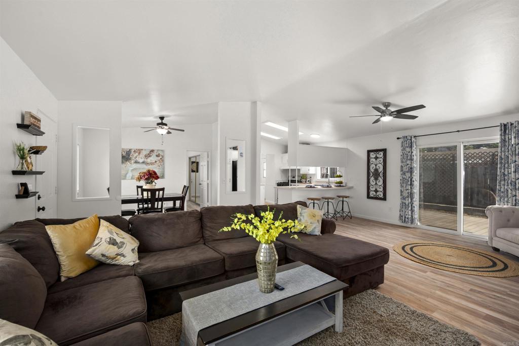 8620 Atlas View Drive Santee, CA 92071 - Photo 15 of 58 a living room with furniture and a potted plant