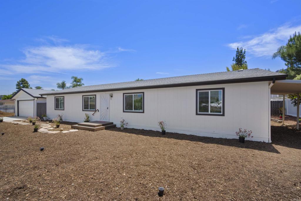 8620 Atlas View Drive Santee, CA 92071 - Photo 2 of 58 a view of a house with a backyard