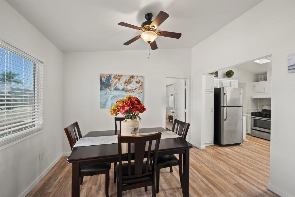 8620 Atlas View Drive Santee, CA 92071 - Photo 21 of 58 a dining room with furniture and window
