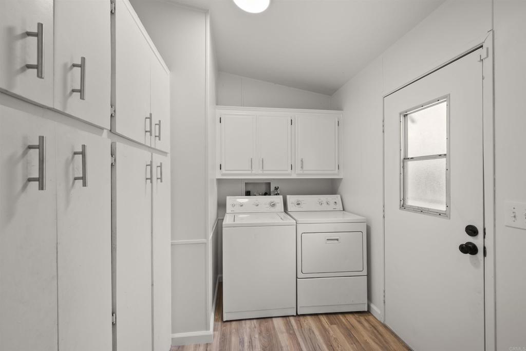 8620 Atlas View Drive Santee, CA 92071 - Photo 29 of 58 a view of a storage & utility room with a washer dryer