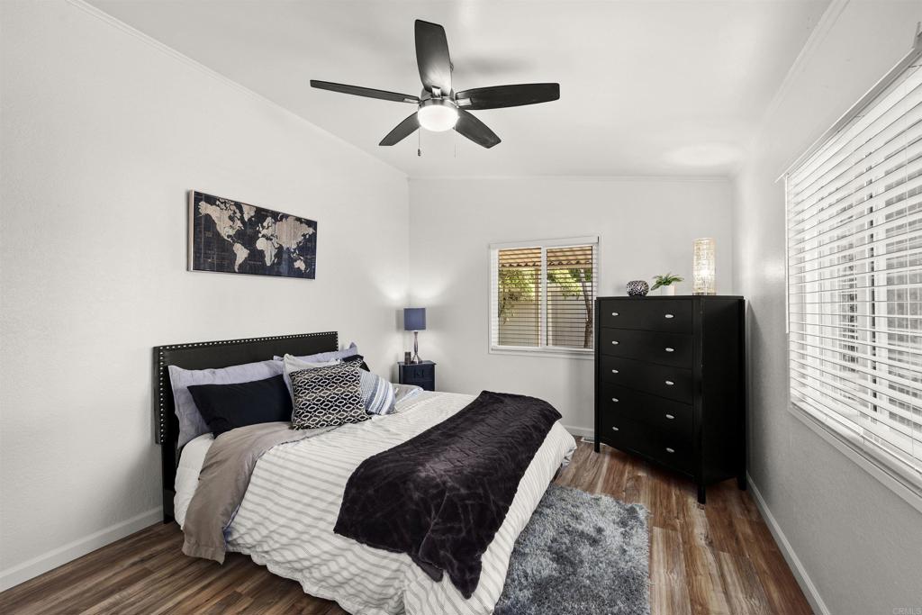 8620 Atlas View Drive Santee, CA 92071 - Photo 36 of 58 a bedroom with a bed and a window