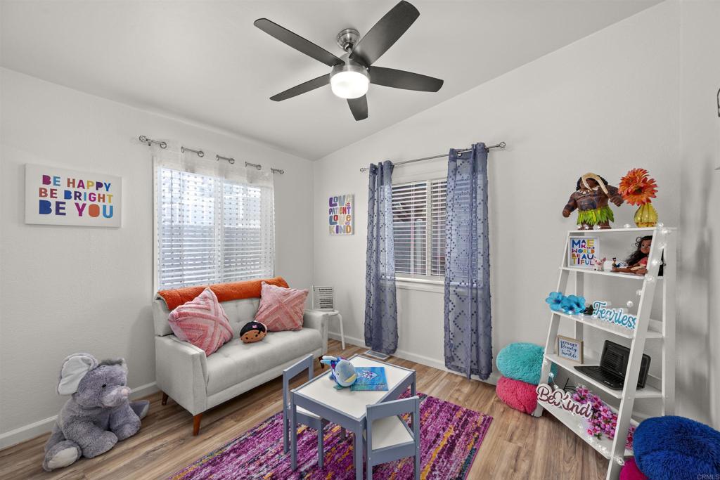 8620 Atlas View Drive Santee, CA 92071 - Photo 38 of 58 a living room with furniture and a table