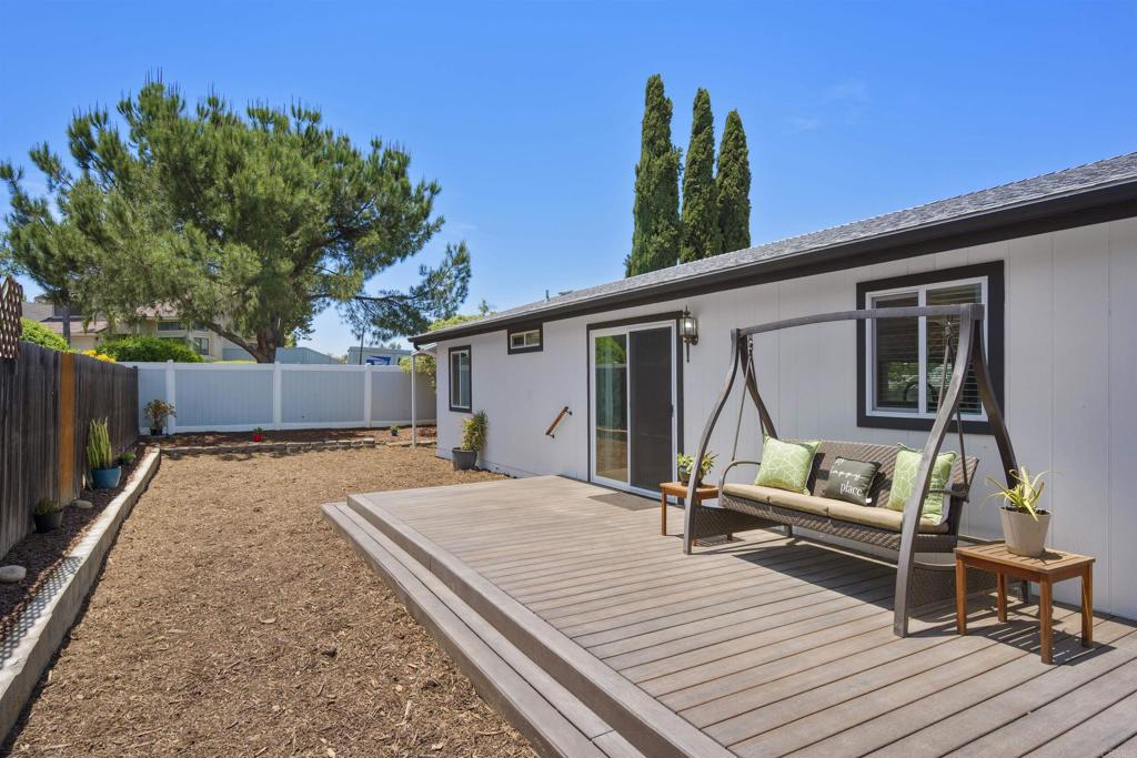 8620 Atlas View Drive Santee, CA 92071 - Photo 44 of 58 a backyard of a house with seating space