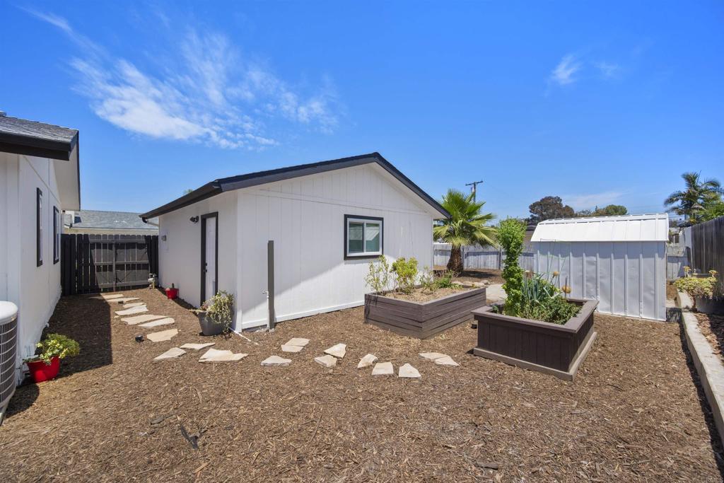 8620 Atlas View Drive Santee, CA 92071 - Photo 53 of 58 a view of a house with backyard and sitting area
