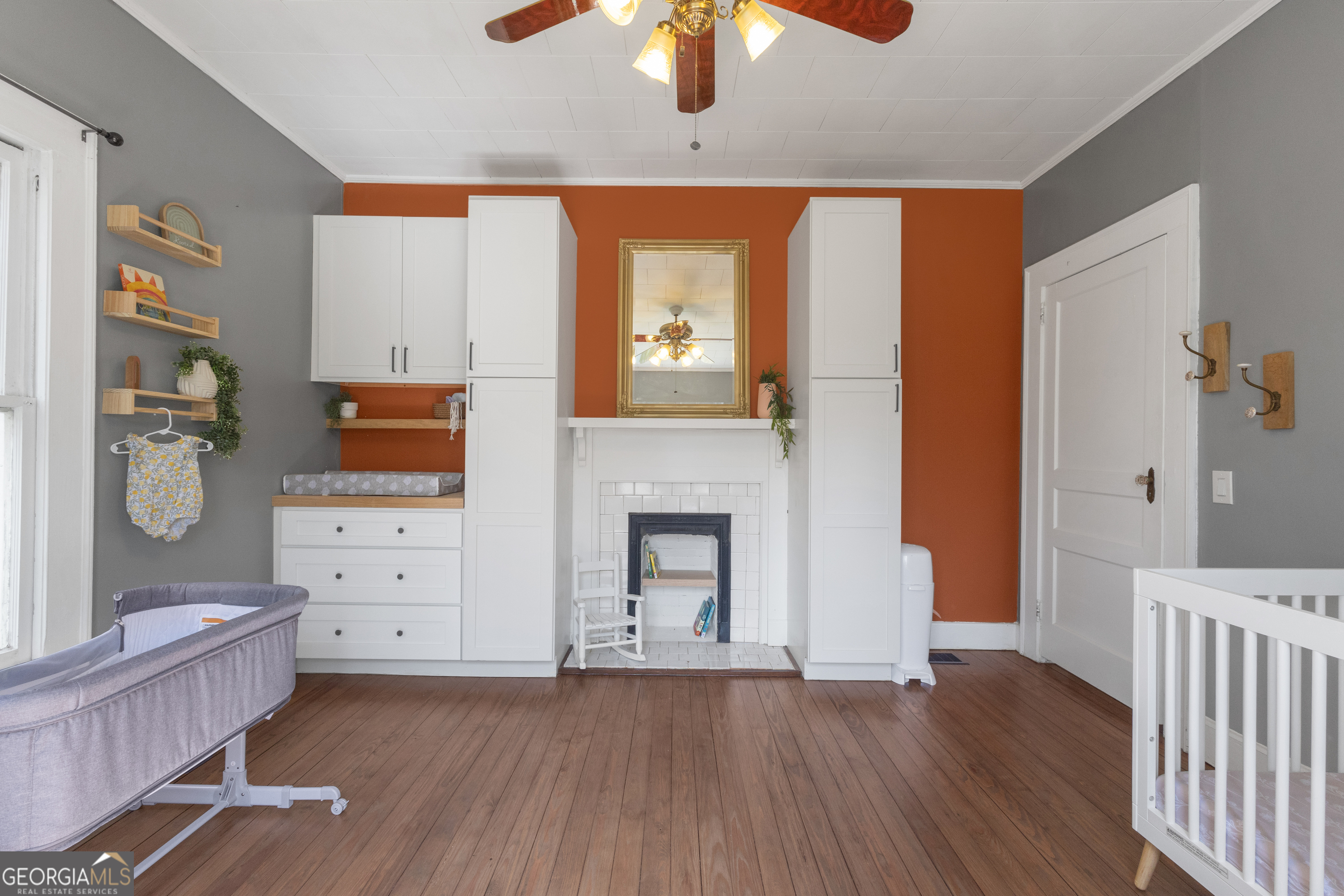 32 Post Street Grantville, GA 30220 - Photo 13 of 39 a view of an empty room with a window and fireplace