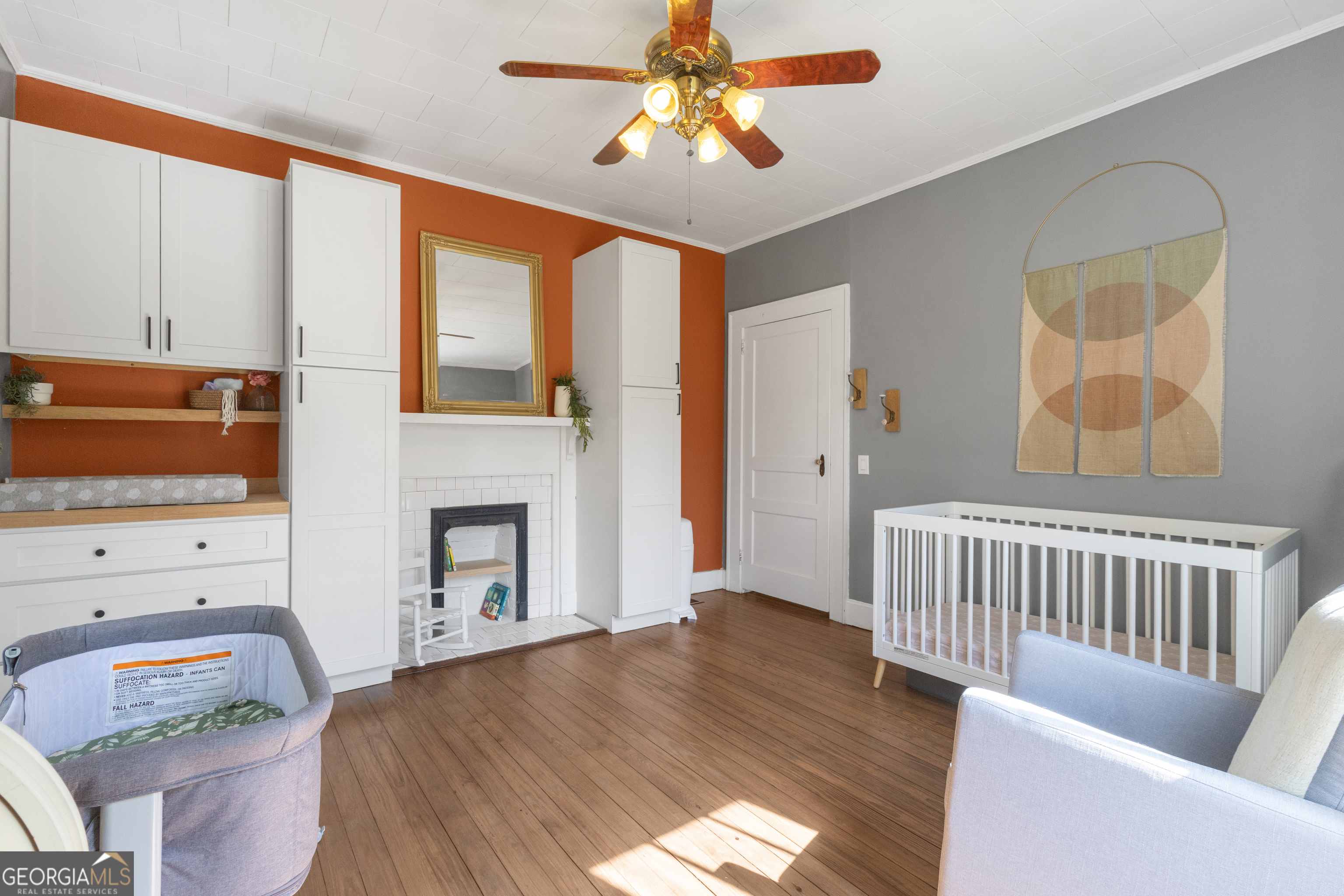 32 Post Street Grantville, GA 30220 - Photo 14 of 39 a bedroom with furniture and a fireplace