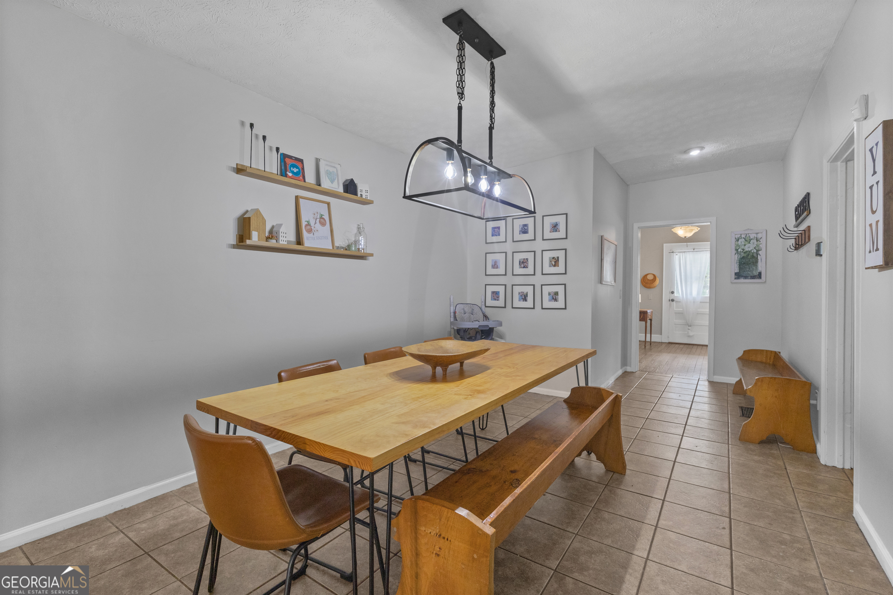 32 Post Street Grantville, GA 30220 - Photo 18 of 39 a dining room with a table and chairs
