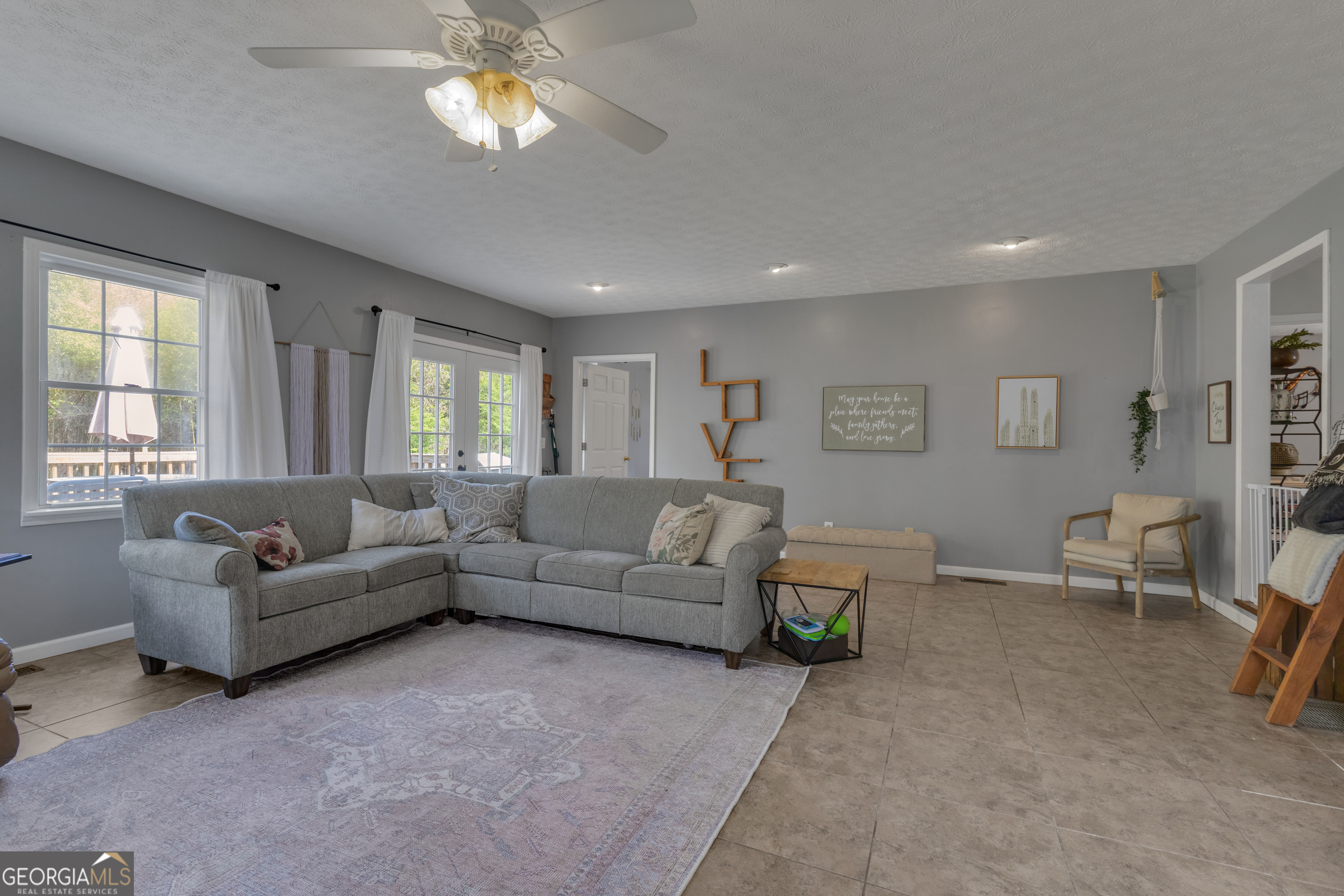32 Post Street Grantville, GA 30220 - Photo 26 of 39 a living room with furniture and a window