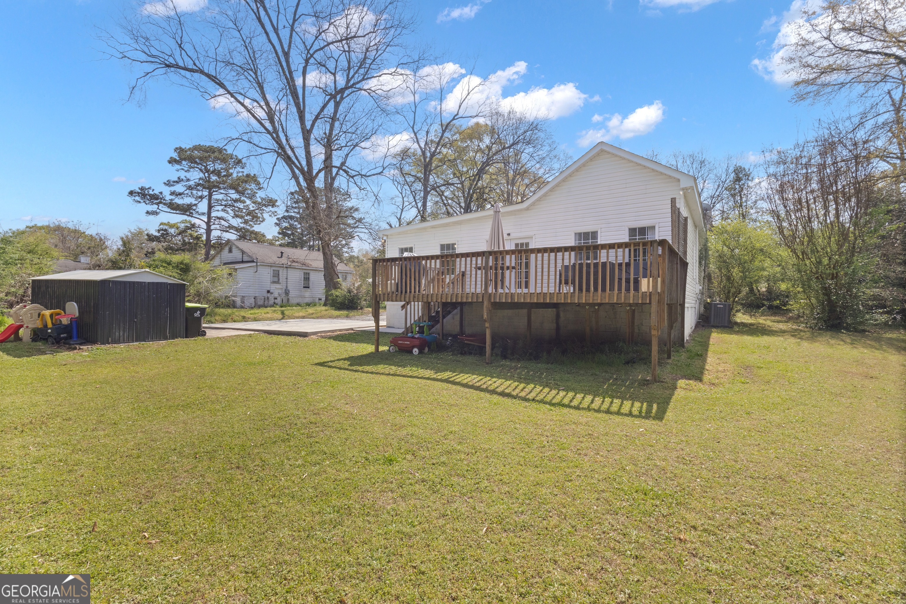 32 Post Street Grantville, GA 30220 - Photo 35 of 39 a view of a house with a yard