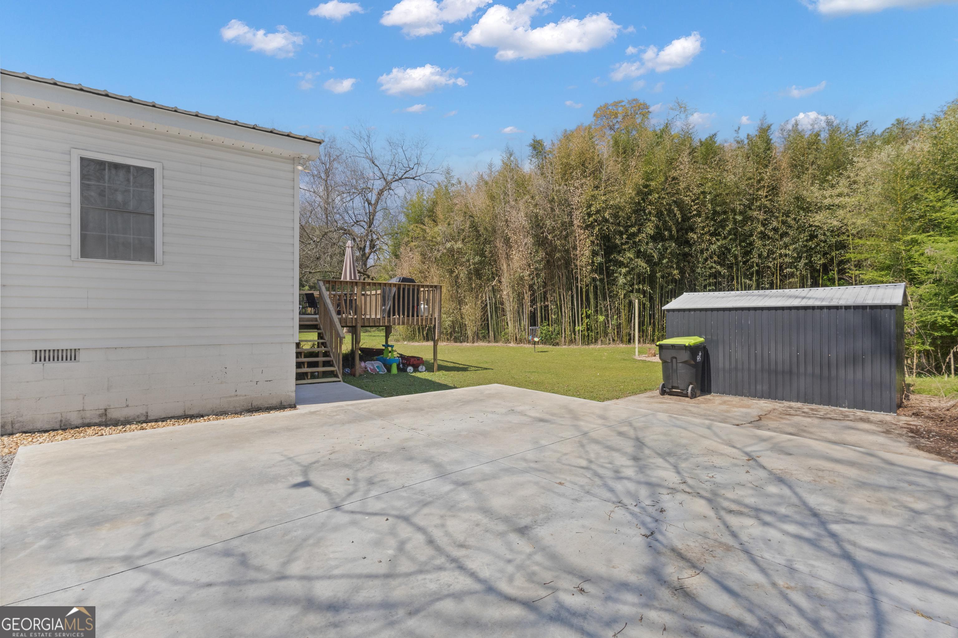32 Post Street Grantville, GA 30220 - Photo 36 of 39 a view of a house with a yard and a large tree