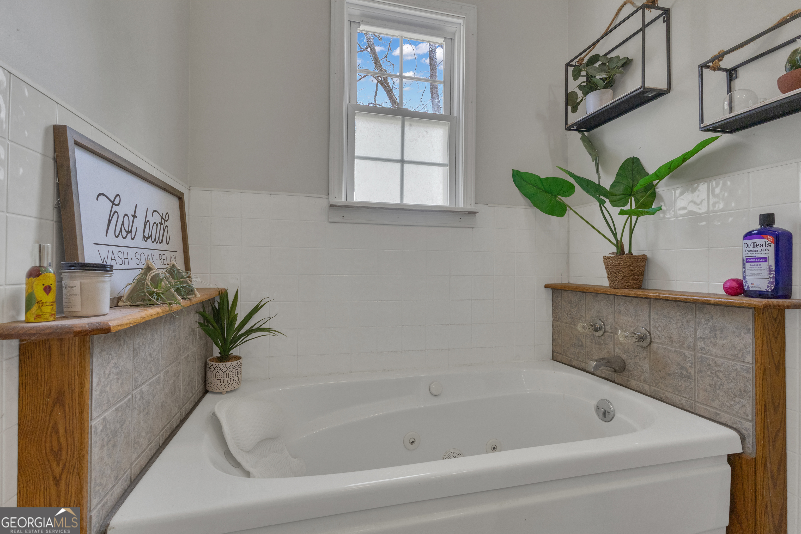 32 Post Street Grantville, GA 30220 - Photo 9 of 39 a bath tub sitting next to a window