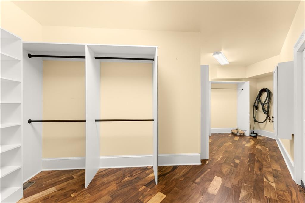 725 County Farm Road Jefferson, GA 30549 - Photo 33 of 66 a view of a bedroom with a wooden floor