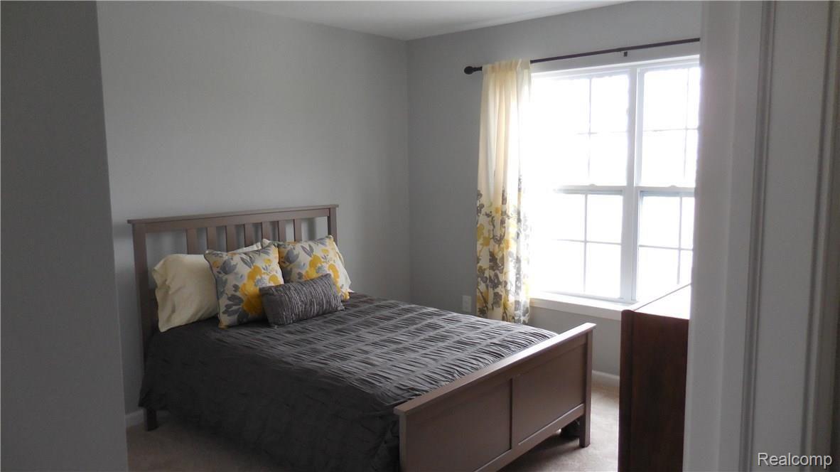 9388 Rickett Road Brighton, MI 48116 - Photo 16 of 24 Bedroom 2
