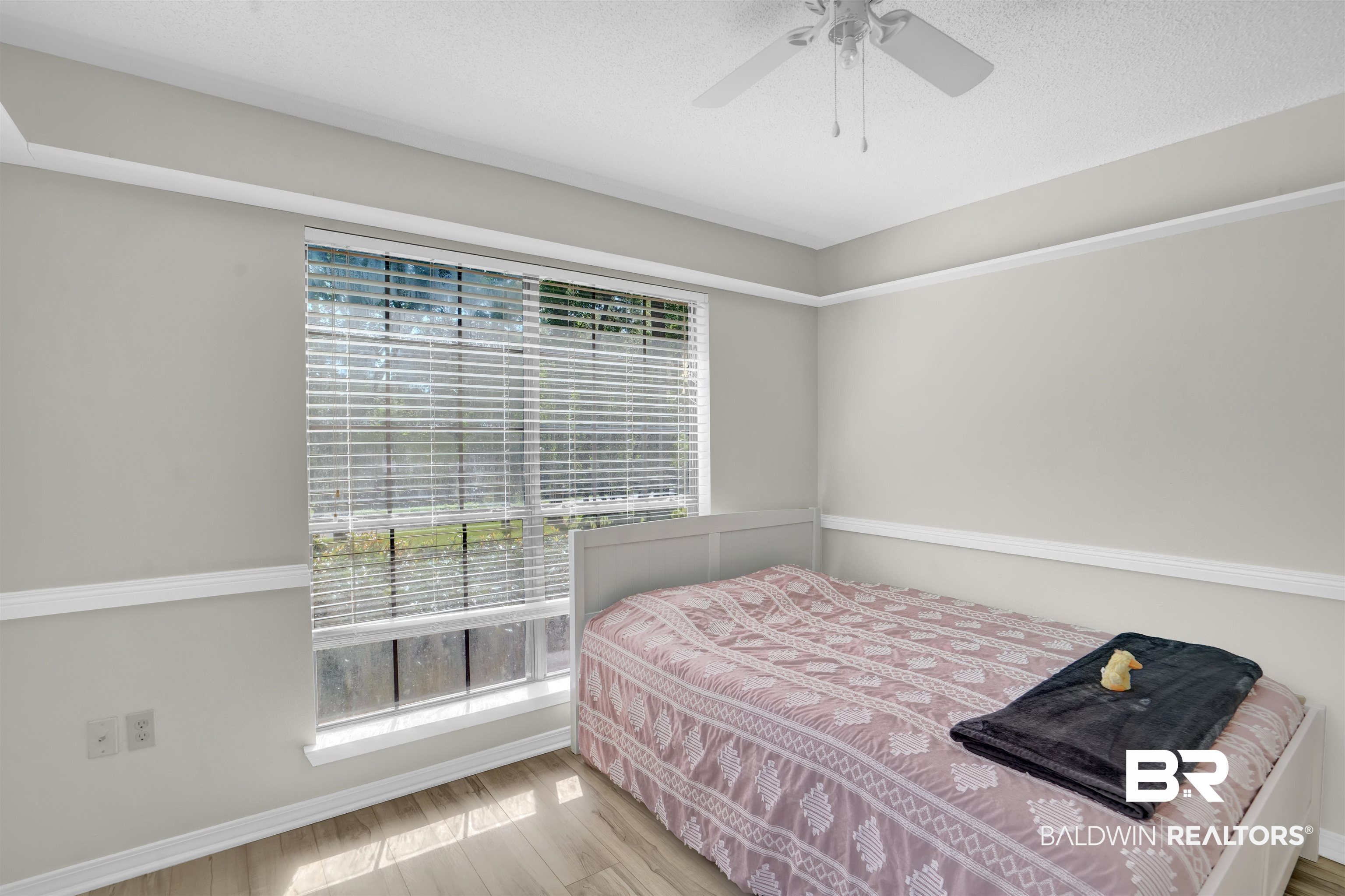 30871 Stanton Road Spanish Fort, AL 36527 - Photo 20 of 35 Bedroom featuring ceiling fan and wood-type flooring