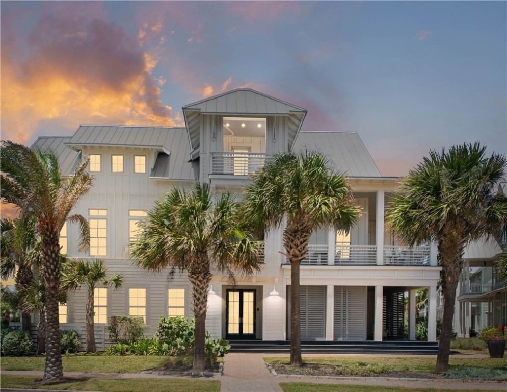 front view of a residential houses with a yard