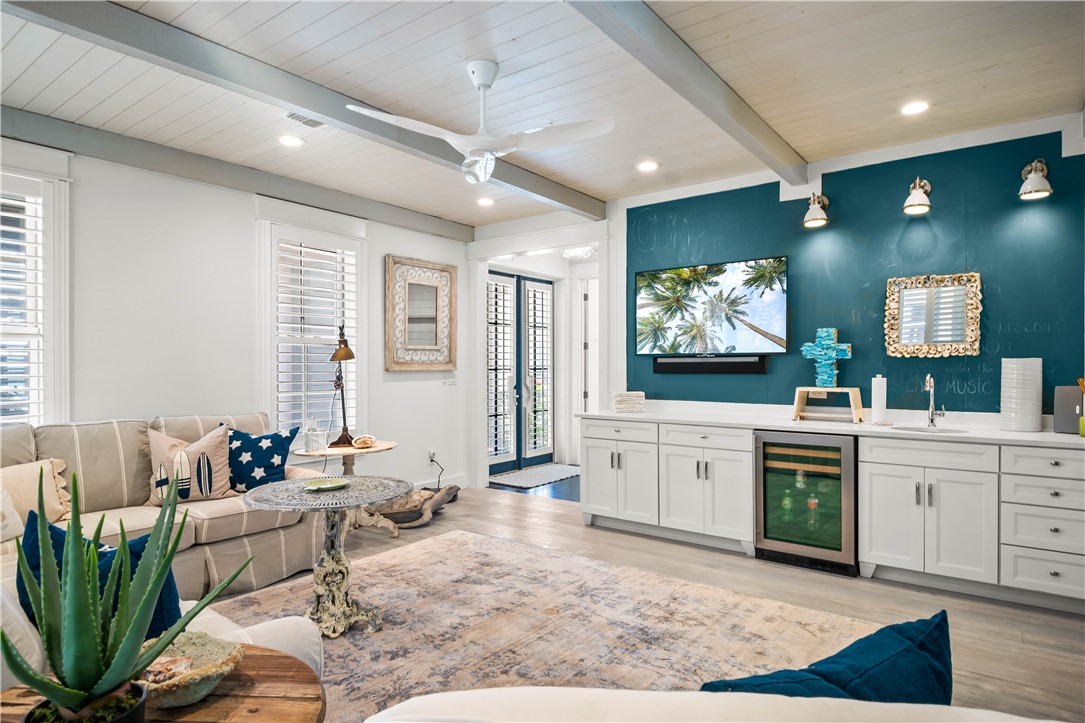 200 Round Road Port Aransas, TX 78373 - Photo 19 of 38 a large open kitchen with a large window and stainless steel appliances
