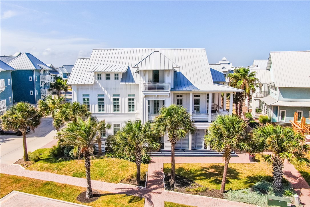 200 Round Road Port Aransas, TX 78373 - Photo 2 of 38 a view of a house with backyard and plants