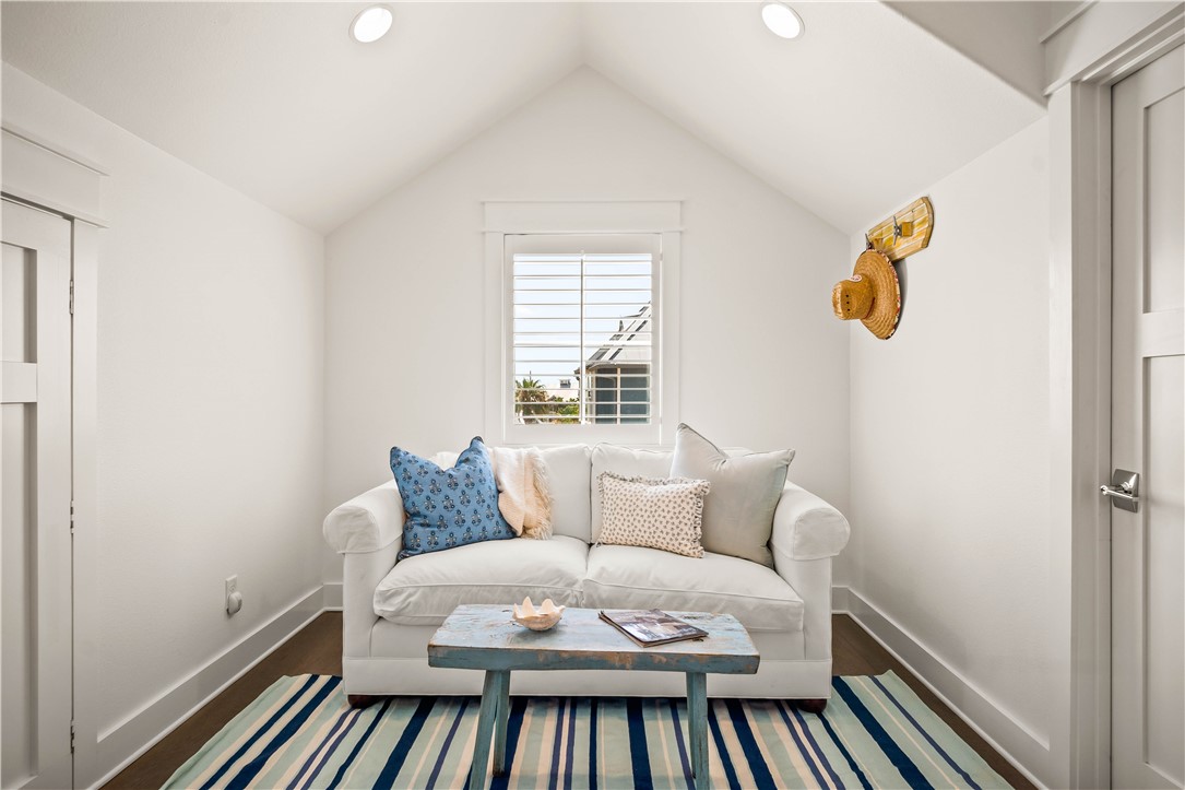200 Round Road Port Aransas, TX 78373 - Photo 25 of 38 a view of a bedroom with furniture and wooden floor