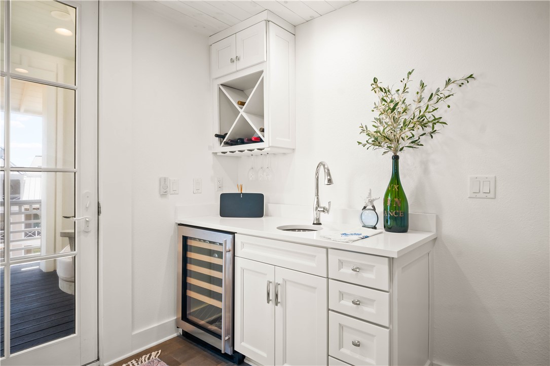 200 Round Road Port Aransas, TX 78373 - Photo 27 of 38 a room with a sink and a mirror