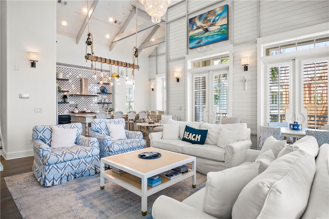 200 Round Road Port Aransas, TX 78373 - Photo 4 of 38 a living room with furniture a table and a large window