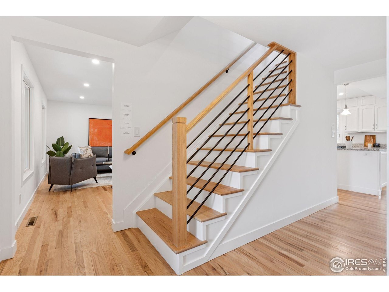 6916 Hunter Place Boulder, CO 80301 - Photo 4 of 40 Beautiful entry with custom stairwell with a clean, modern look.